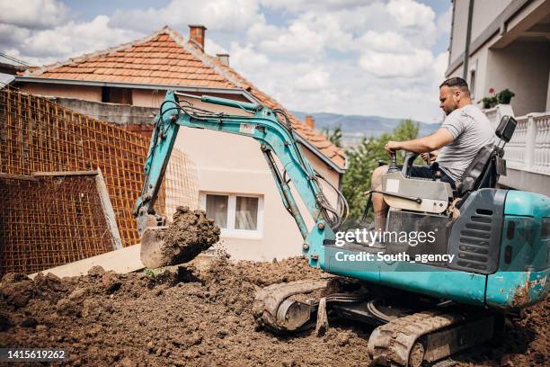Man Operating Backhoe Backhoe Yard Photos and Premium High Res Pictures - Getty Images