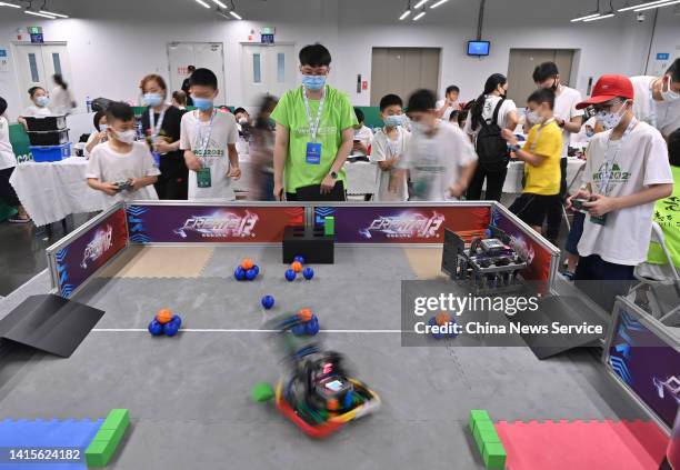 Teenagers take part in the Youth Robot Design Contest as a part of 2022 World Robot Conference at Beijing Etrong International Exhibition &...