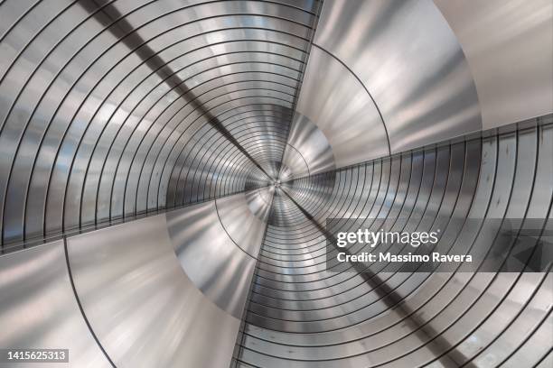 gray metallic spiral pattern - construction circle stockfoto's en -beelden