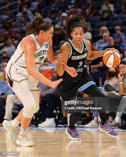 Candace Parker of the Chicago Sky drives to the basket against Stefanie Dolson of the New York Liberty in Game One of the First Round of the 2022...