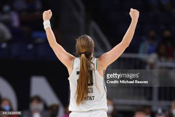 Sabrina Ionescu of the New York Liberty celebrates after defeating the Chicago Sky in Game One of the First Round of the 2022 WNBA Playoffs at...