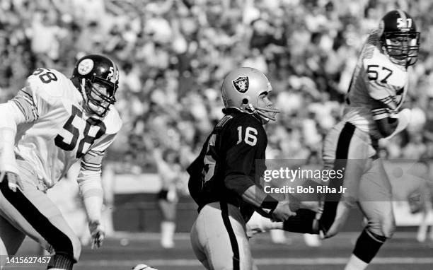 Raiders QB Jim Plunkett during game action against Pittsburgh Steelers in playoff game, January 1, 1984 in Los Angeles, California.