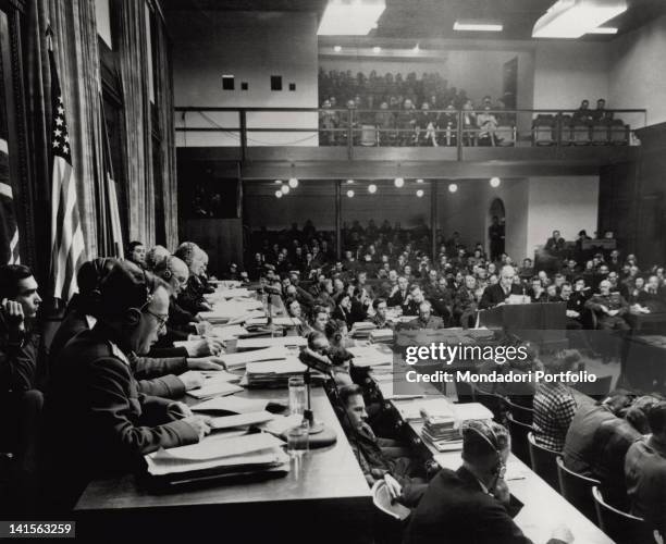 One of the representatives of the prosecution speaks to the court. Notice Colonel Alexander F. Volchkov, the president Geoffrey F. Lawrence and the...