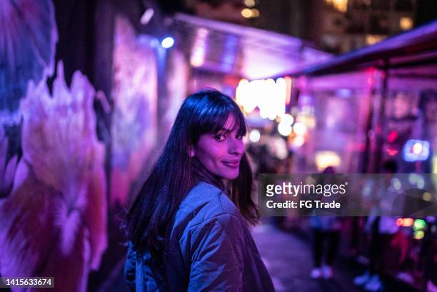 portrait of a young woman at nightclub - festival brasil stock pictures, royalty-free photos & images