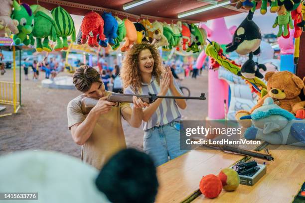 Funfair Rifle Range Photos and Premium High Res Pictures - Getty Images
