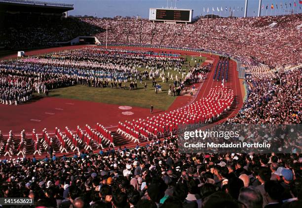 At the end of the numerous delegations, the Japanese team is parading. The host nation follows the Yugoslav delegation. Tokyo , October 10, 1964.
