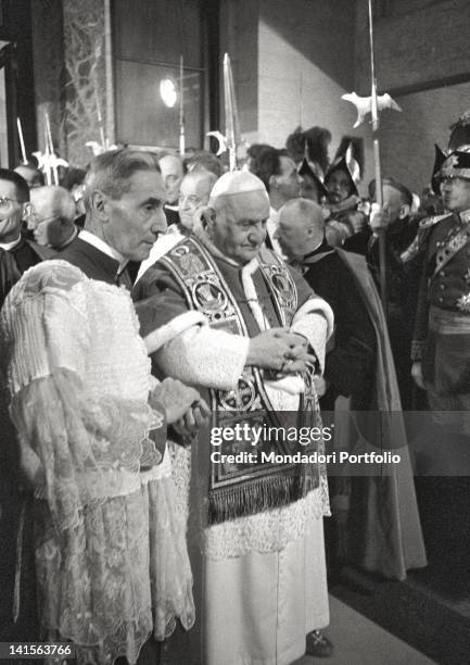 Pope John XXIII, born Angelo Giuseppe Roncalli, accompanied by the ecclesiastical authorities during the traslation of Saint Pio X. Venice, April 19,...