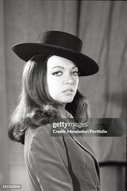 The Italian actress Bedy Moratti posing for a portrait wearing a hat. Italy, 1960s