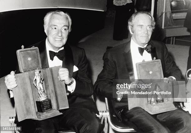 The director and actor Vittorio De Sica and the US actor Henry Fonda are photographed together in the ancient theatre of Taormina for the 18th...
