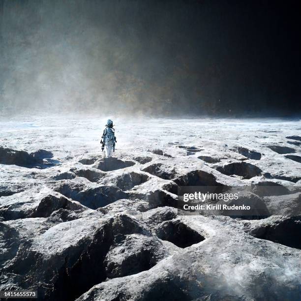astronaut standing on the surface of unknown planet - terreno extremo - fotografias e filmes do acervo