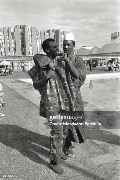 The two US sprinters of the athletic team, Tommie Smith and John Carlos, are joking in the Olympic Village of Mexico City, not far from the outdoor...