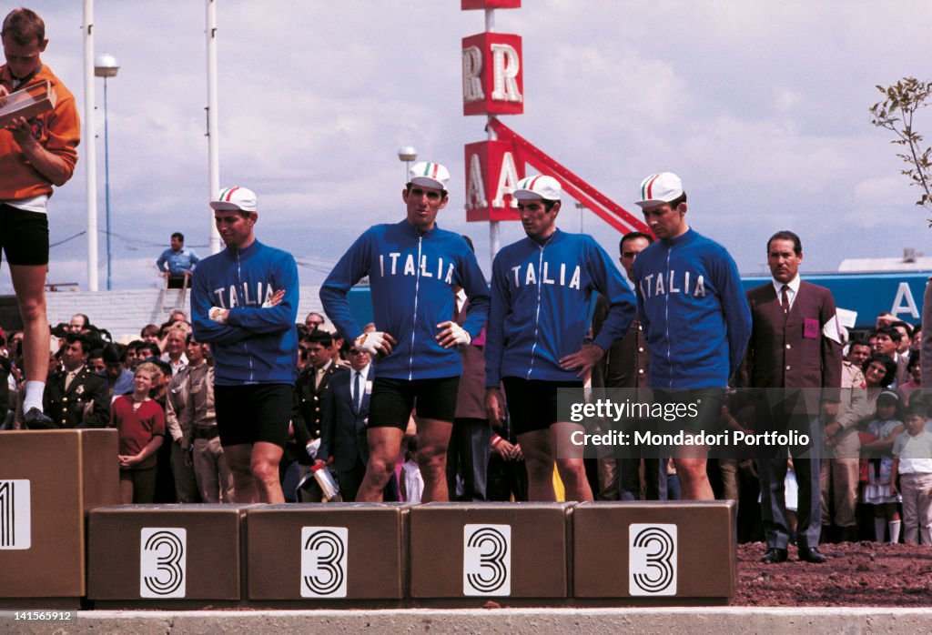 The Italian Team, Third In Men'S Team Time Trial (100 Km), Is Mounting The Olympic Podium To Be Awarded