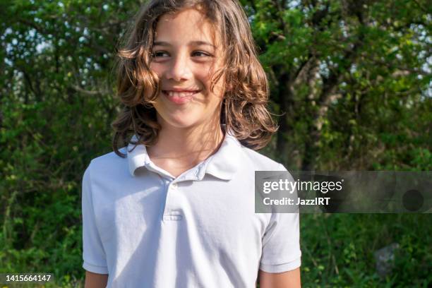 cute boy portrait - boy with long hair stock pictures, royalty-free photos & images