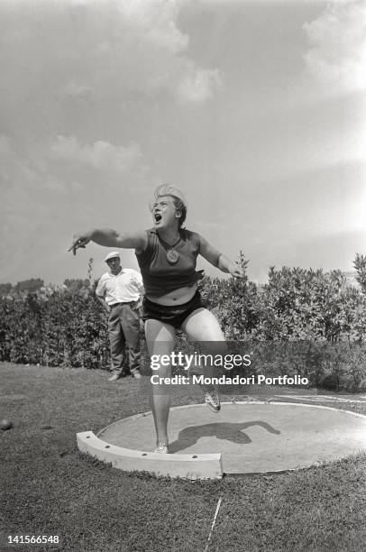 Soviet shot putter Tamara Press training at the Rome Olympic Games. Rome, 1960