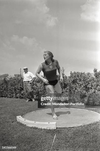 Soviet shot putter Tamara Press training at the Rome Olympic Games. Rome, 1960