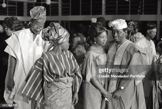 Nigerian men and women dancing in a club. Nigeria