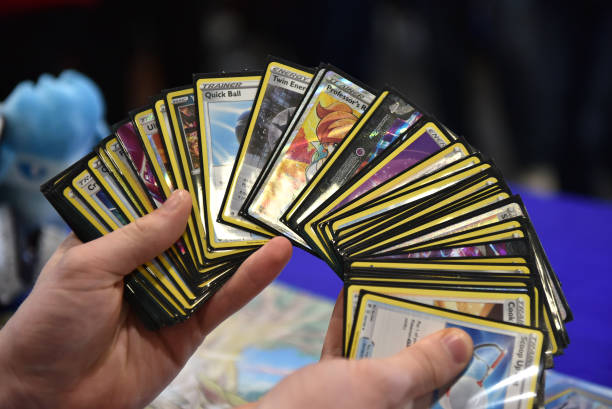 Competitor holds a deck while playing Pokemon cards during the 2022 Pokémon World Championships at ExCel on August 18, 2022 in London, England. For...