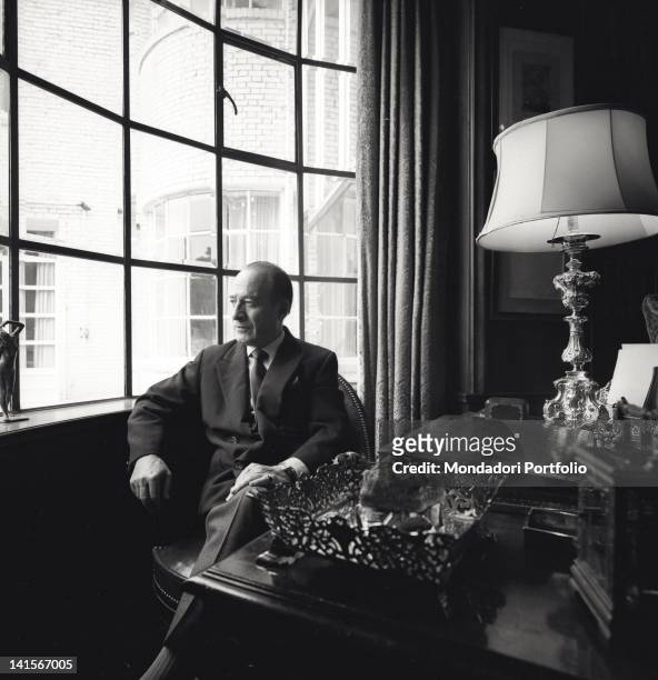 The Italian industrialist Bruno Pagliai sitting by the window of his study in his mansion in Mexico City. Mexico City, October 1968