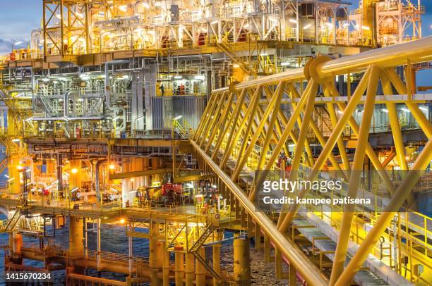 oil and gas drilling rig over offshore platform - oil rig fire stock pictures, royalty-free photos & images