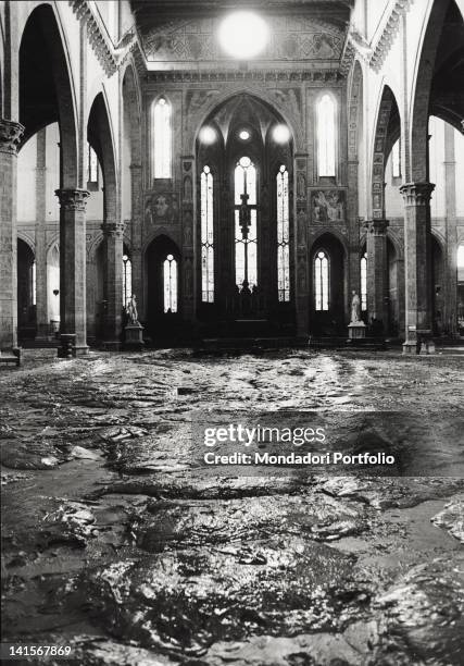 The Arno River has overflowed flooding the basilica of Santa Croce. Florence, November 1966