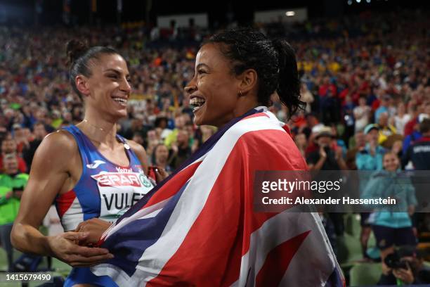 Bronze medalist Jazmin Sawyers of Great Britain and gold medalist Ivana Vuleta of Serbia celebrate following the Women's Long Jump Final during the...