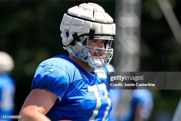Frank Ragnow of the Detroit Lions looks on during the joint practice with the Indianapolis Colts at Grand Park on August 18, 2022 in Westfield,...