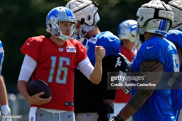 Jared Goff of the Detroit Lions interacts with his teammates during the joint practice with the Indianapolis Colts at Grand Park on August 18, 2022...