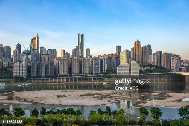 The Jialing River bed at the confluence with the Yangtze River is exposed due to drought on August 18, 2022 in Chongqing, China. The water level of...