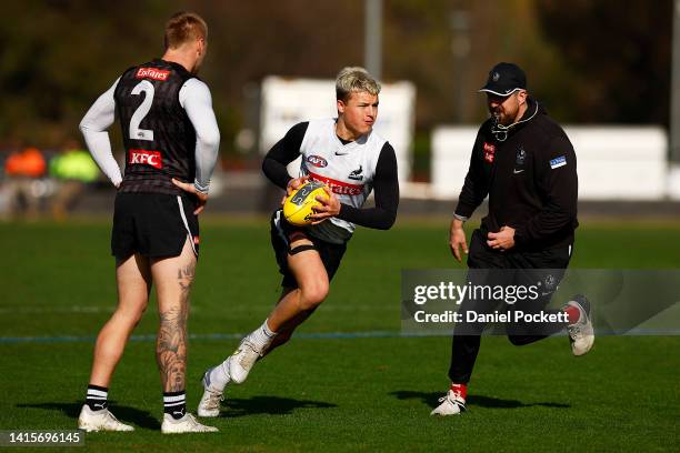 Jack Ginnivan of the Magpies in action during a Collingwood Magpies AFL training session at Olympic Park Oval on August 19, 2022 in Melbourne,...