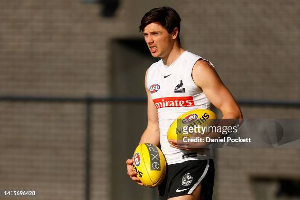 Oliver Henry of the Magpies in action during a Collingwood Magpies AFL training session at Olympic Park Oval on August 19, 2022 in Melbourne,...