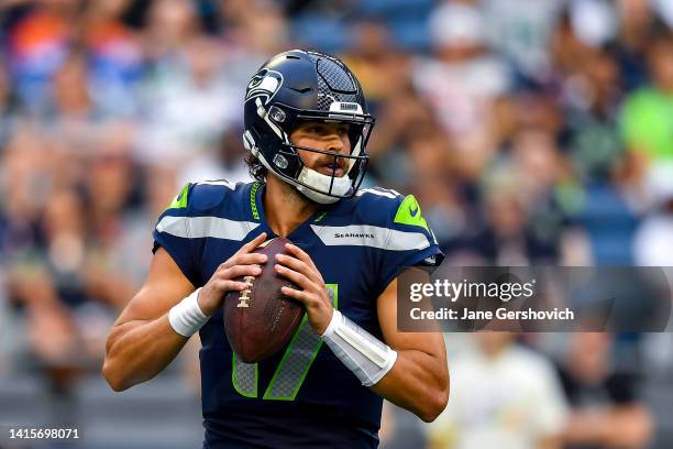 Jacob Eason of the Seattle Seahawks throws a pass in the third quarter during the preseason game against. The Chicago Bears at Lumen Field on August...