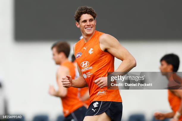 Charlie Curnow of the Blues smiles during a Carlton Blues AFL training session at Ikon Park on August 19, 2022 in Melbourne, Australia.