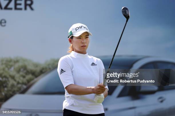Hinako Shibuno of Japan is seen before her tee shot on the 17th hole during day two of the Simone Asia Pacific Cup at Pondok Indah Golf Course on...