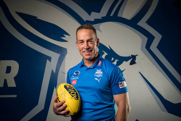Alastair Clarkson poses for a photo during a North Melbourne Kangaroos AFL Media Opportunity at Arden Street Ground on August 19, 2022 in Melbourne,...