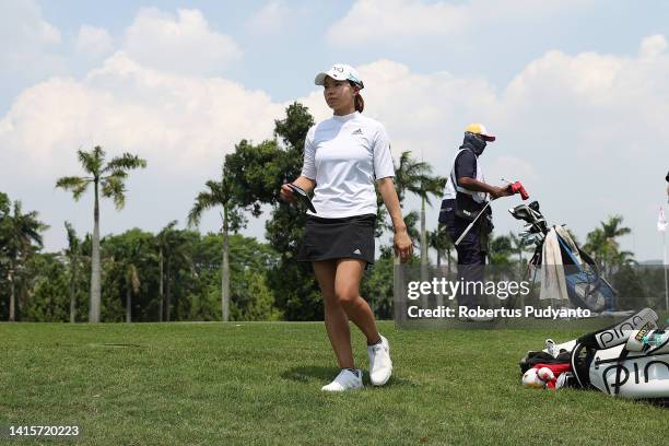 Hinako Shibuno of Japan is seen after holing out on the 9th green during day two of the Simone Asia Pacific Cup at Pondok Indah Golf Course on August...