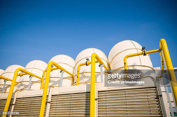 sets of cooling towers in conditioning systems - cooling tower stockfoto's en -beelden