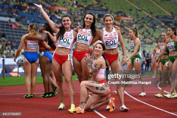Magdalena Stefanowicz, Marika Popowicz-Drapala, Ewa Swoboda and Martyna Kotwila of Poland celebrate following the Women's 4x100m Relay Round 1 - Heat...