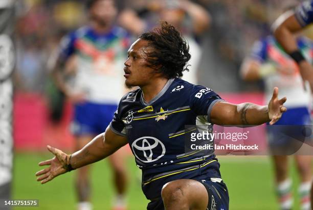 Luciano Leilua of the Cowboys celebrates after scoring a try during the round 23 NRL match between the North Queensland Cowboys and the New Zealand...