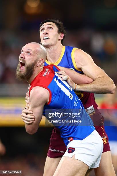 Max Gawn of the Demons and Oscar McInerney of the Lions compete for the ball during the round 23 AFL match between the Brisbane Lions and the...