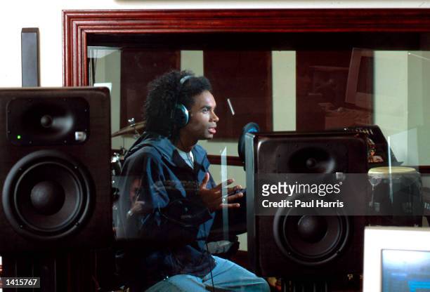 Milli Vanilli''s Fabrice Morvan listens during studio work May 1, 2000 in Los Angeles, CA. Fabrice is currently writing and singing his own music for...