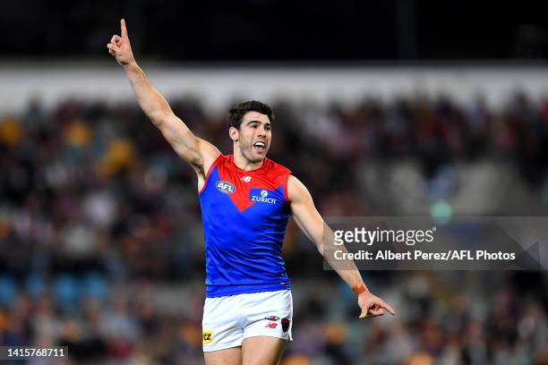 Christian Petracca of the Demons celebrates kicking a goal during the round 23 AFL match between the Brisbane Lions and the Melbourne Demons at The...