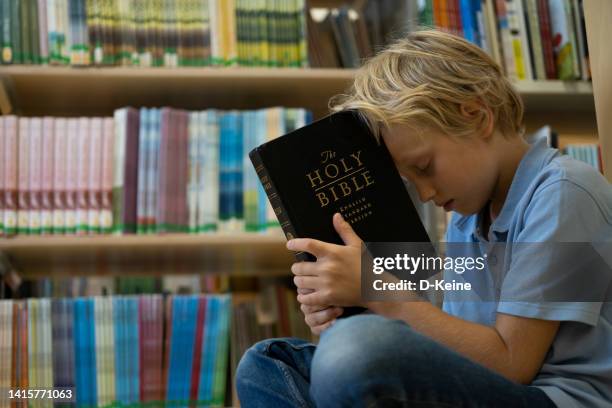 holy bible - holy-spirit-catholic-elementary-school stock pictures, royalty-free photos & images
