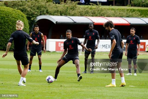 Emil Roback in action during an AC Milan training session at Milanello on August 19, 2022 in Cairate, Italy.