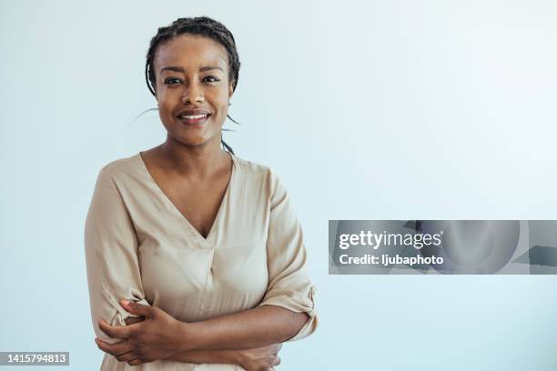 portrait of young african woman - eintracht frankfurt v fc porto uefa europa league round of 32 stockfoto's en -beelden