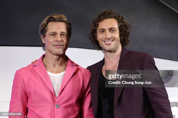 Brad Pitt and Aaron Taylor-Johnson attend the "Bullet Train" premiere at Yongsan CGV on August 19, 2022 in Seoul, South Korea.