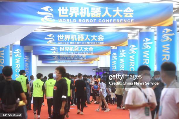 People visit the 2022 World Robot Conference at Beijing Etrong International Exhibition & Convention Center on August 18, 2022 in Beijing, China. The...