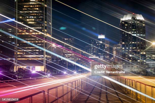 motion blur of business district office buildings - anamorphic lens flare stock pictures, royalty-free photos & images