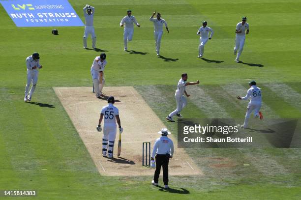 Andrich Nortje of South Africa celebrates with team mates after taking the wicket of Alex Lees of England during day three of the First LV= Insurance...