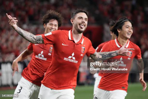 David Moberg of Urawa Red Diamonds celebrates scoring his team's scond goal during the AFC Champions League Round of 16 match between Johor Darul...