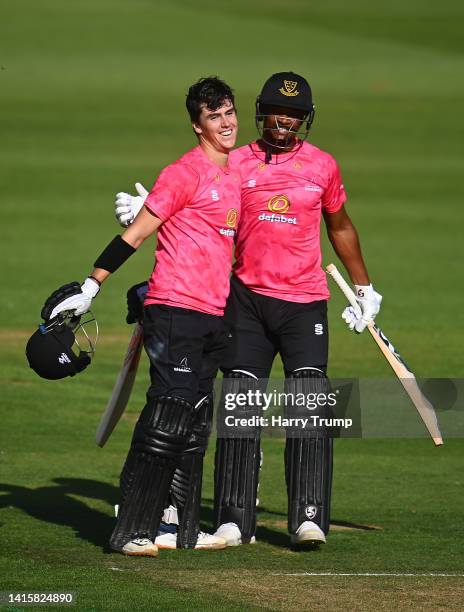Ali Orr of Sussex celebrates their double century with team mate Delray Rawlins during the Royal London One Day Cup match between Somerset and Sussex...